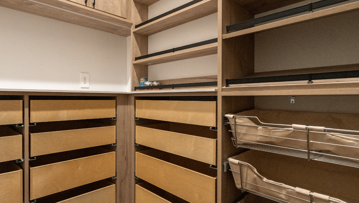 Small Custom Pantry built in can storage racks pull out drawers wire baskets