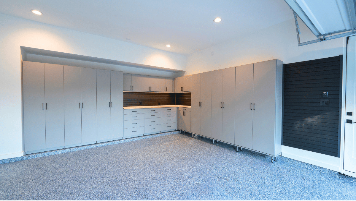 gray custom cabinets with workspace and slatwall - garage storage system