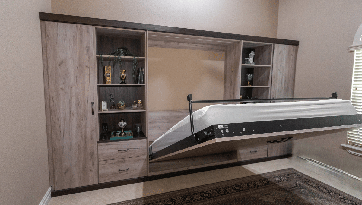 Custom wall bed with shelving and storage designed by SpaceManager Closets