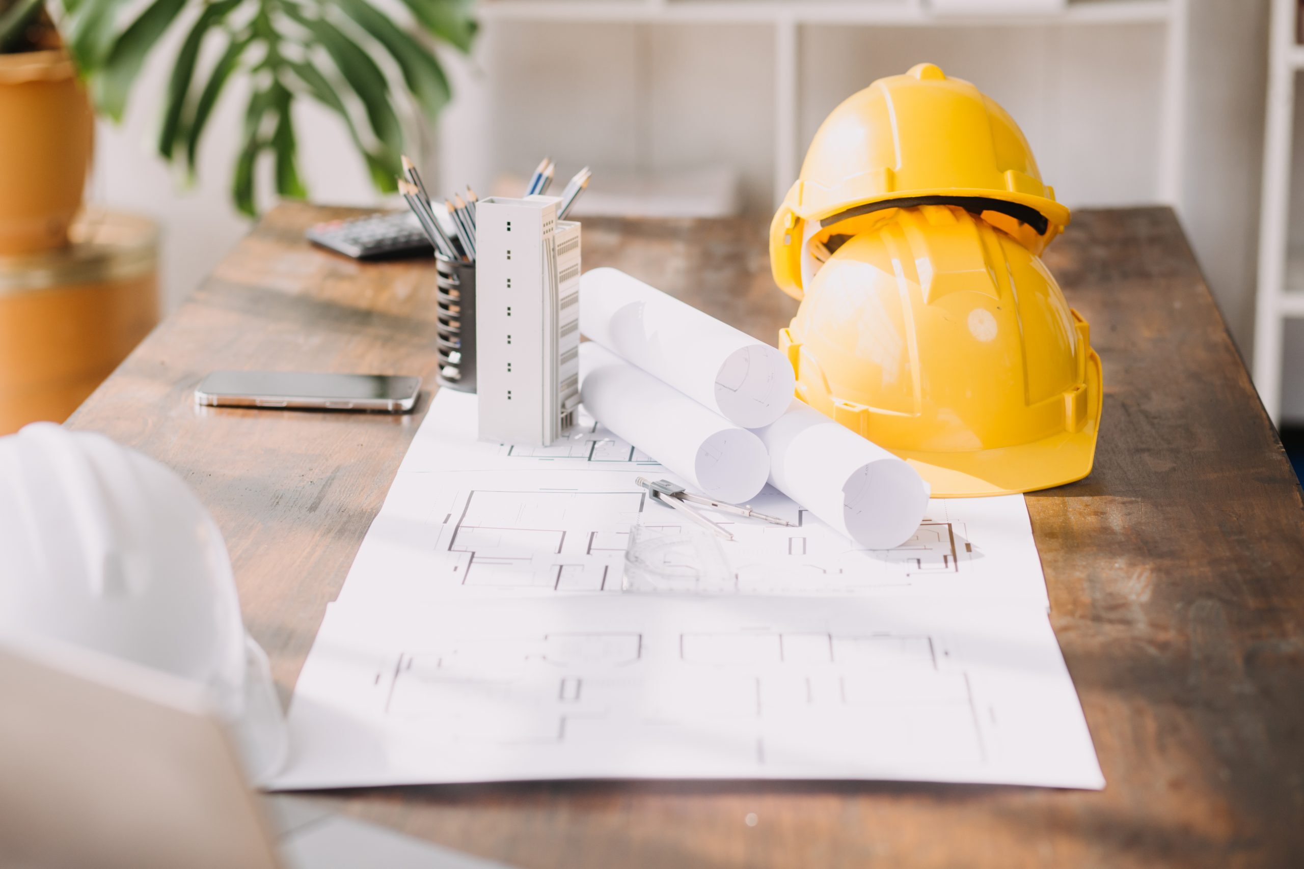 Team reviewing blueprints for a construction project