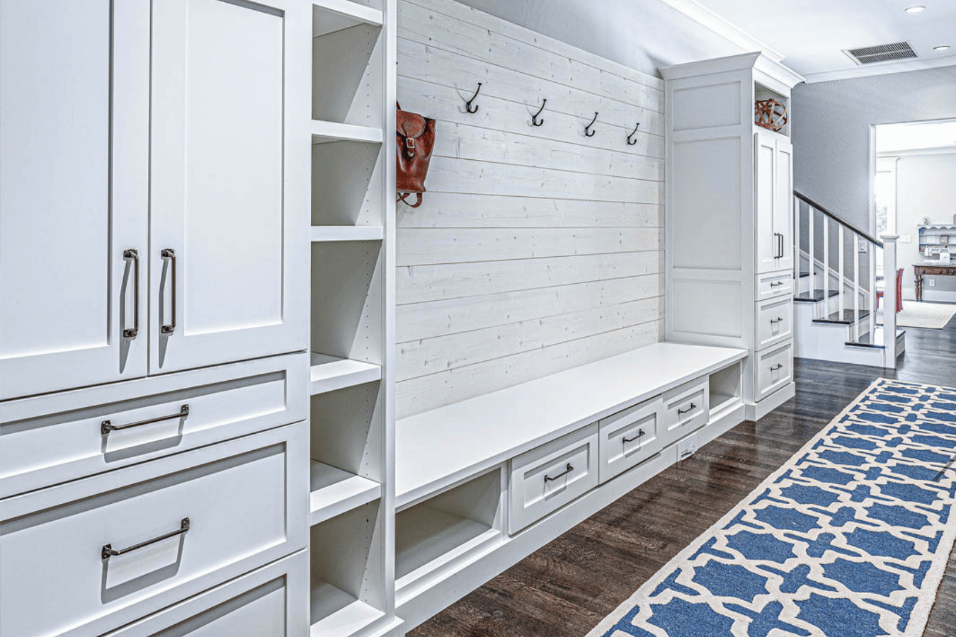 Organized entry spaces that manage shoes, bags, and everyday clutter with ease.
